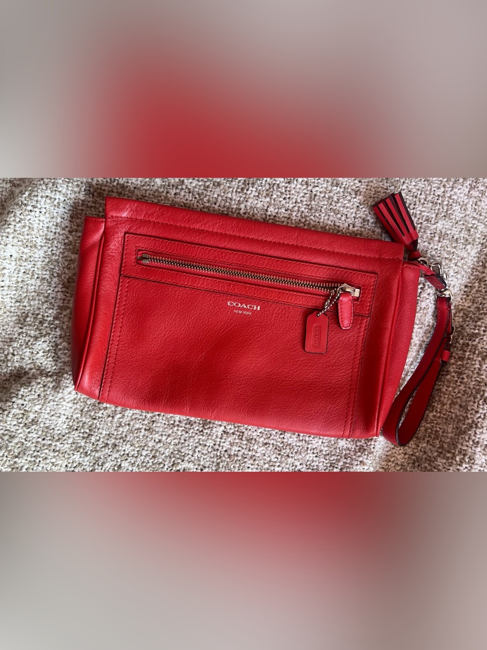 Coach Red Pebbled Leather Front Zip Tassel Wristlet Clutch